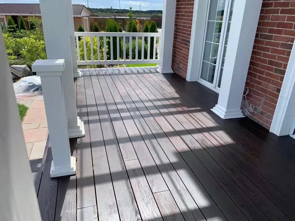 Front porch resurfaced with thermally modified ash decking