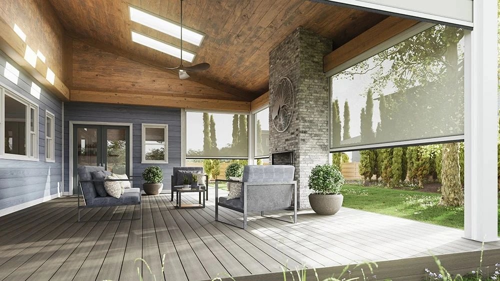 Covered porch with retractable motorized screens lowered