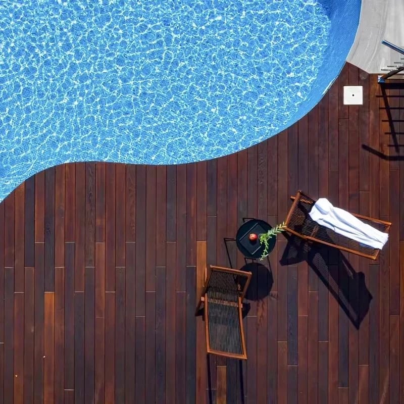 Overhead view of a pool edged in ash decking